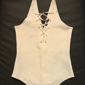 Unworn white Express bodysuit